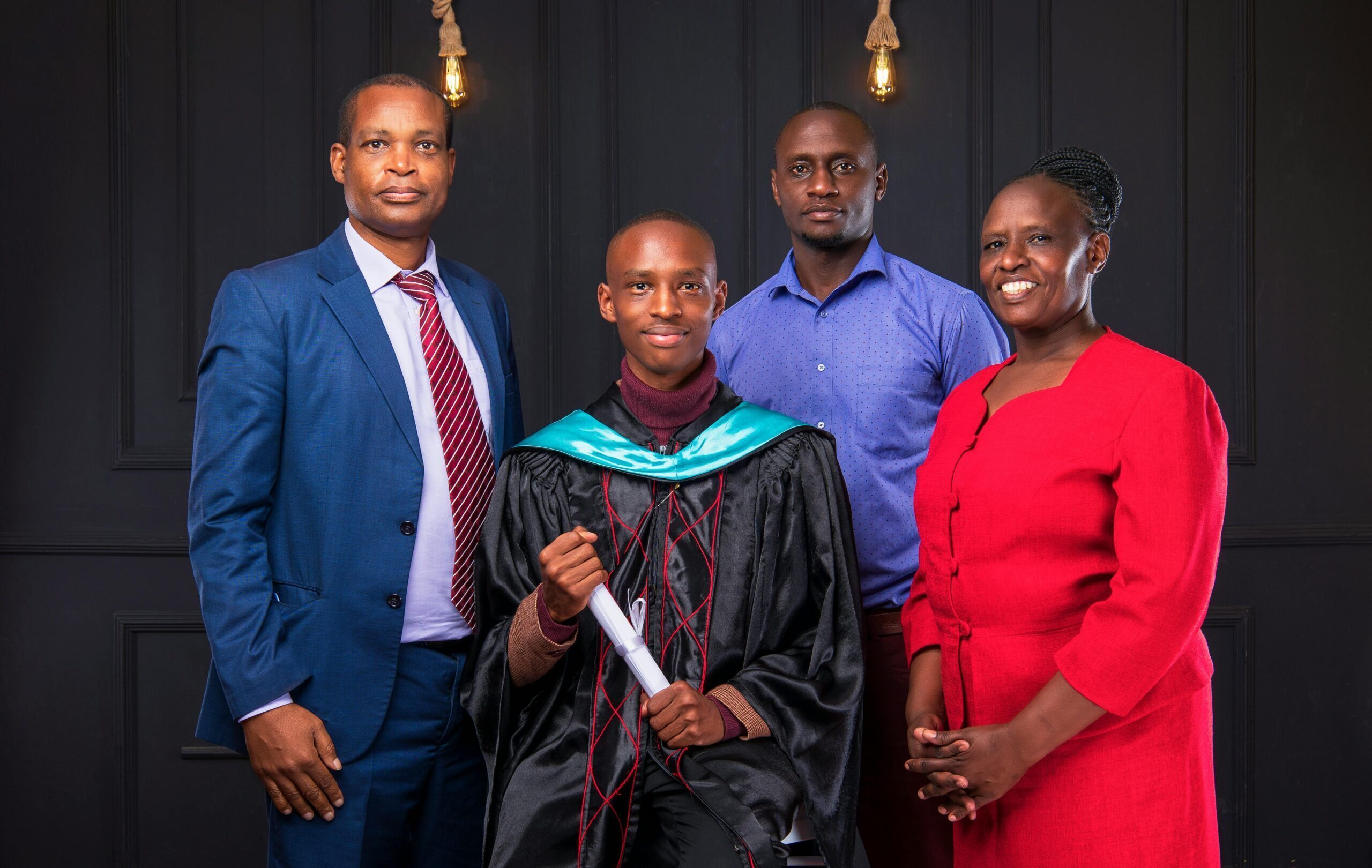 African American family proudly celebrating a graduation in Nairobi.